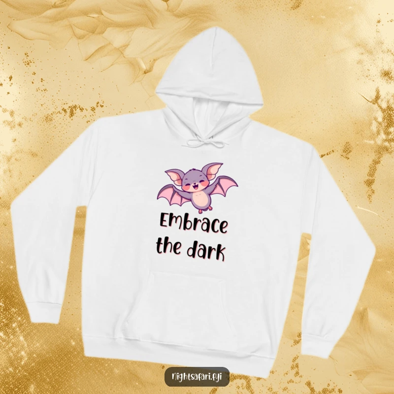 Funny hoodie featuring a giggling bat character performing a fun loop-the-loop overhead, ideal for chilly nights.