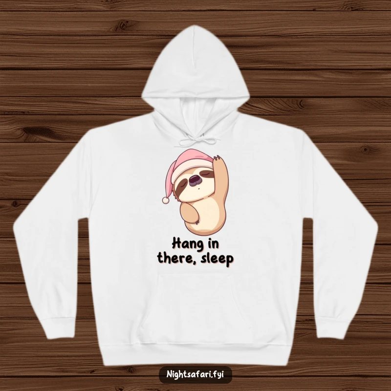Funny Sloth Hoodie featuring a sleepy sloth in a nightcap, hanging upside down, ideal for cozy and humorous loungewear.