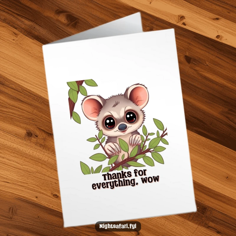 Funny Free Printable Thank You Card: A curious bushbaby with big eyes peering through foliage, saying thank you.