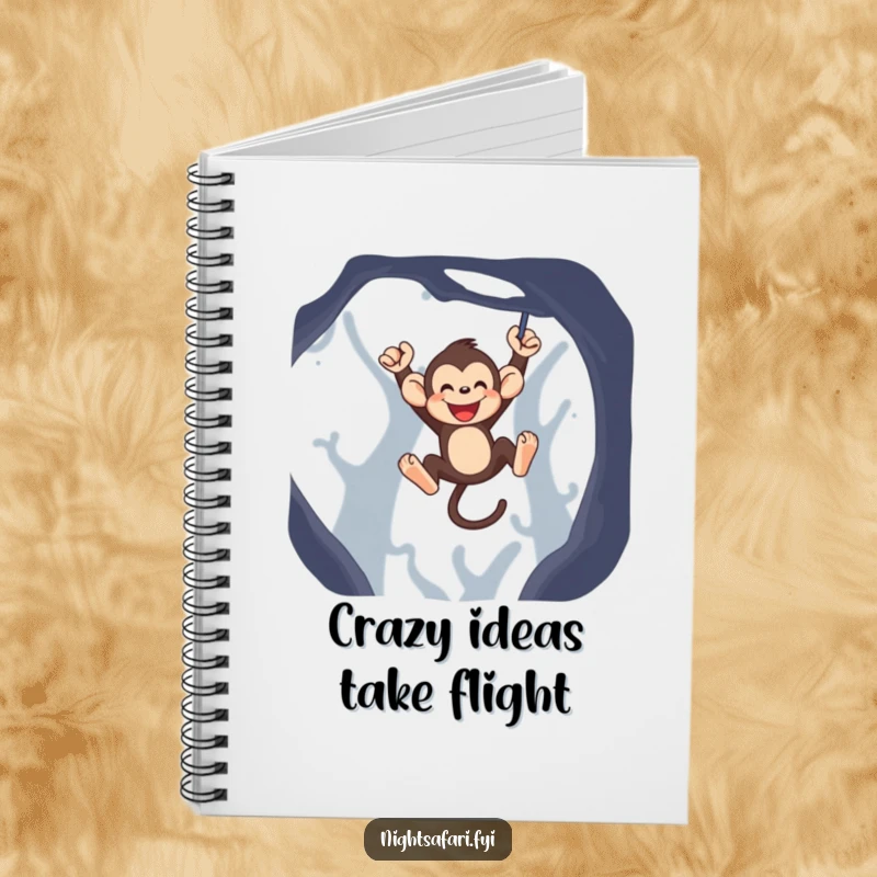 Funny monkey notebook featuring a jubilant monkey character swinging playfully, ready for your notes and doodles.