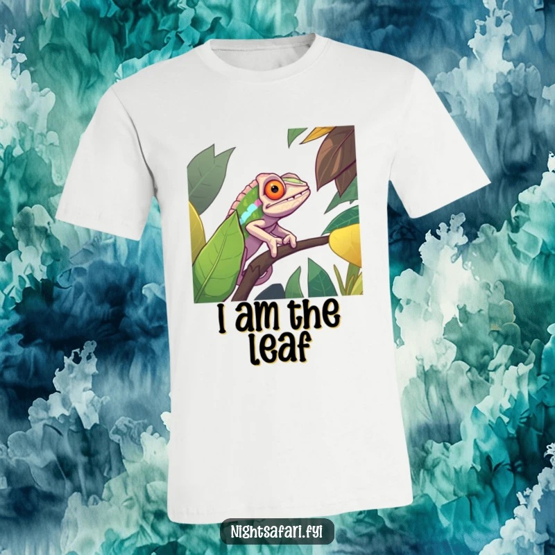 Funny t-shirt featuring a determined chameleon perfectly camouflaged on a vibrant jungle leaf, celebrating the art of disguise with wit.