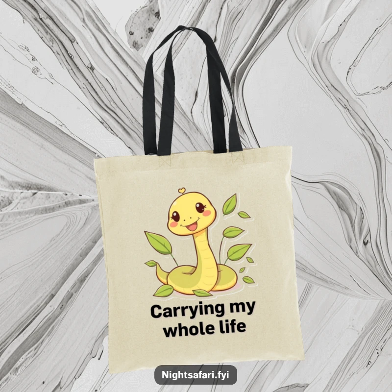 Funny tote bag with a happy snake character shown slithering playfully among autumn leaves.