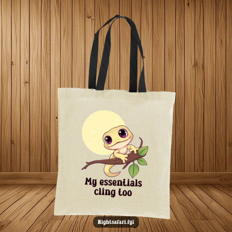 Funny tote bag with a cute gecko, large eyes focused, clinging to a branch under the moonlight.
